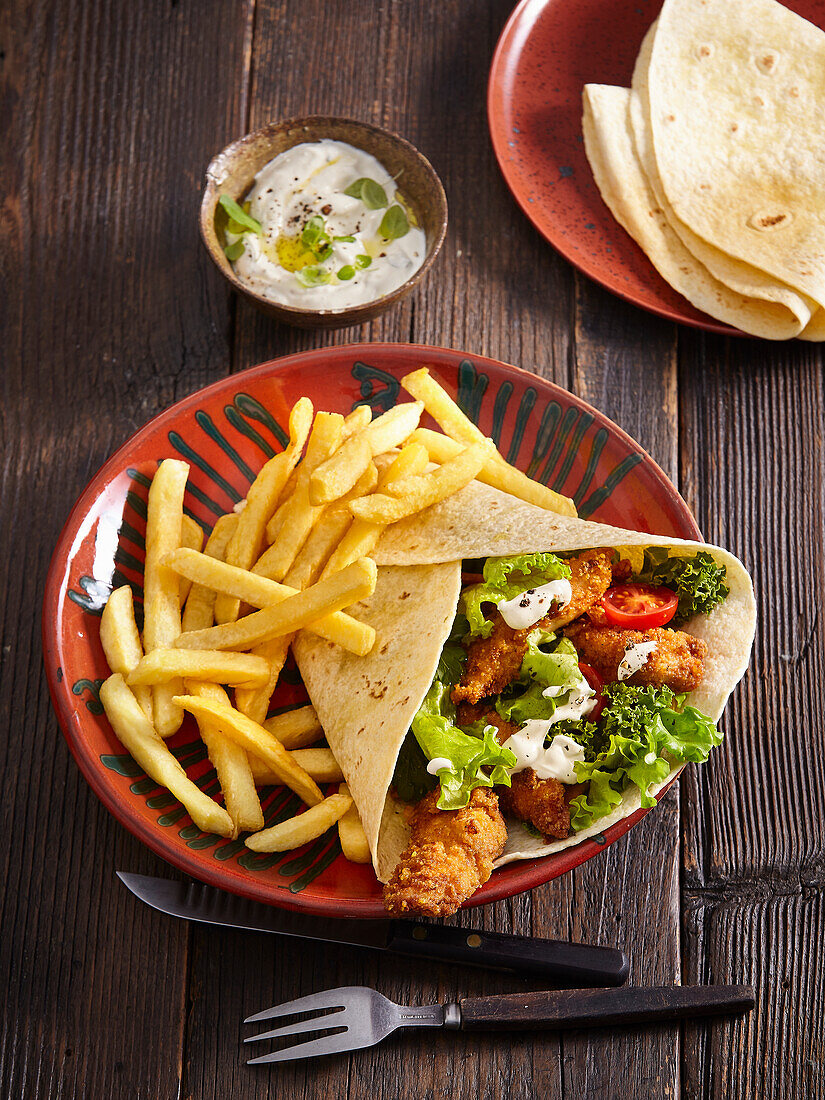 Wrap with chicken fingers and chips