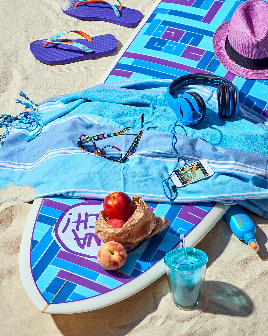 Beach scene with nectarines and milkshake