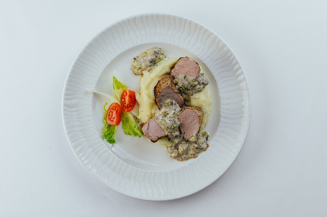 Fillet of pork with herb mousse and mashed potatoes