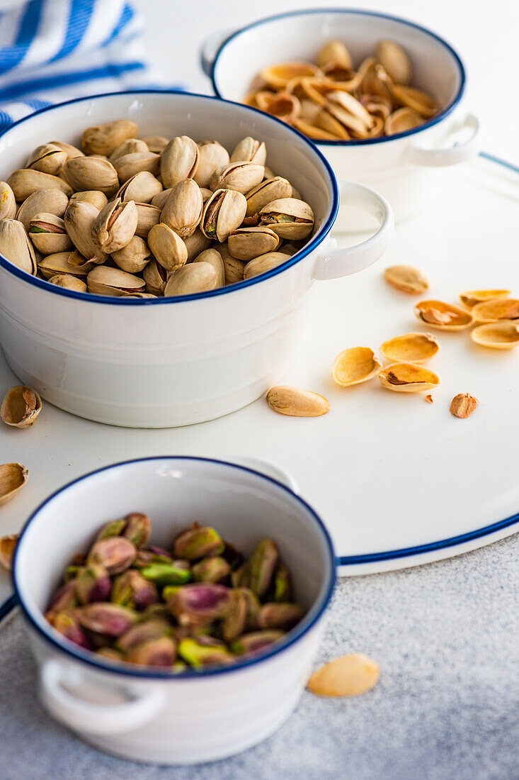 Pistachios in ceramic bowls