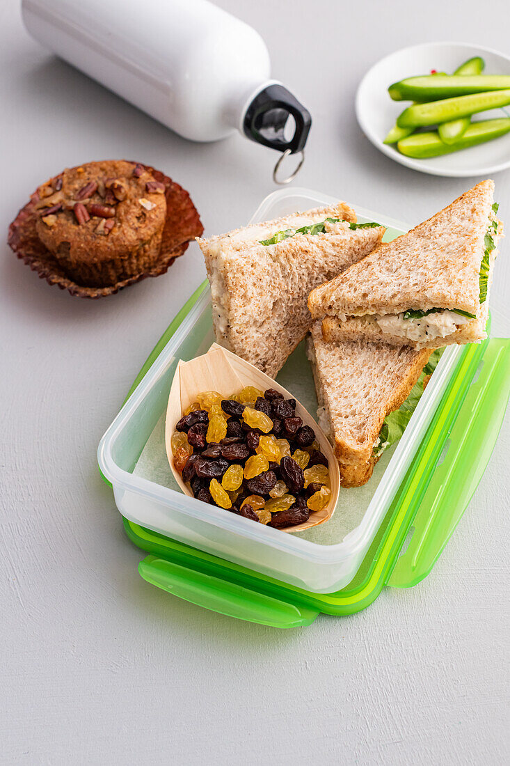 Sandwich corners, raisins, sultanas and a muffin