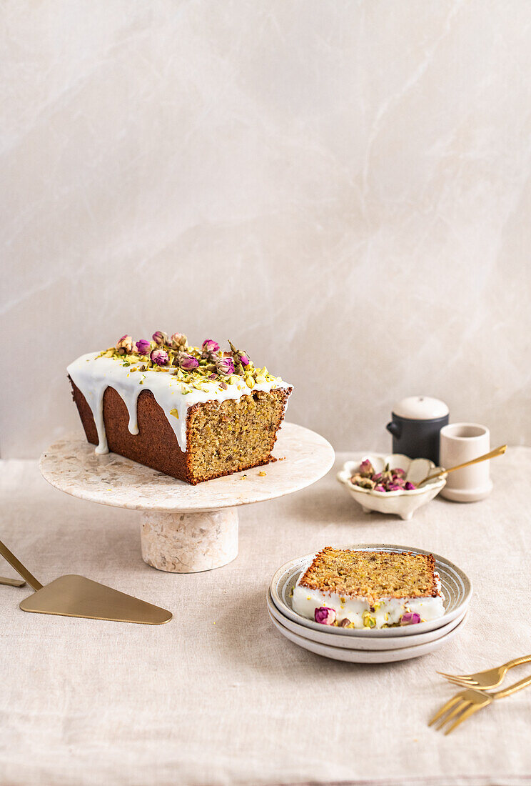 Gluten-free loaf cake with pistachios, lemon, and rose petals
