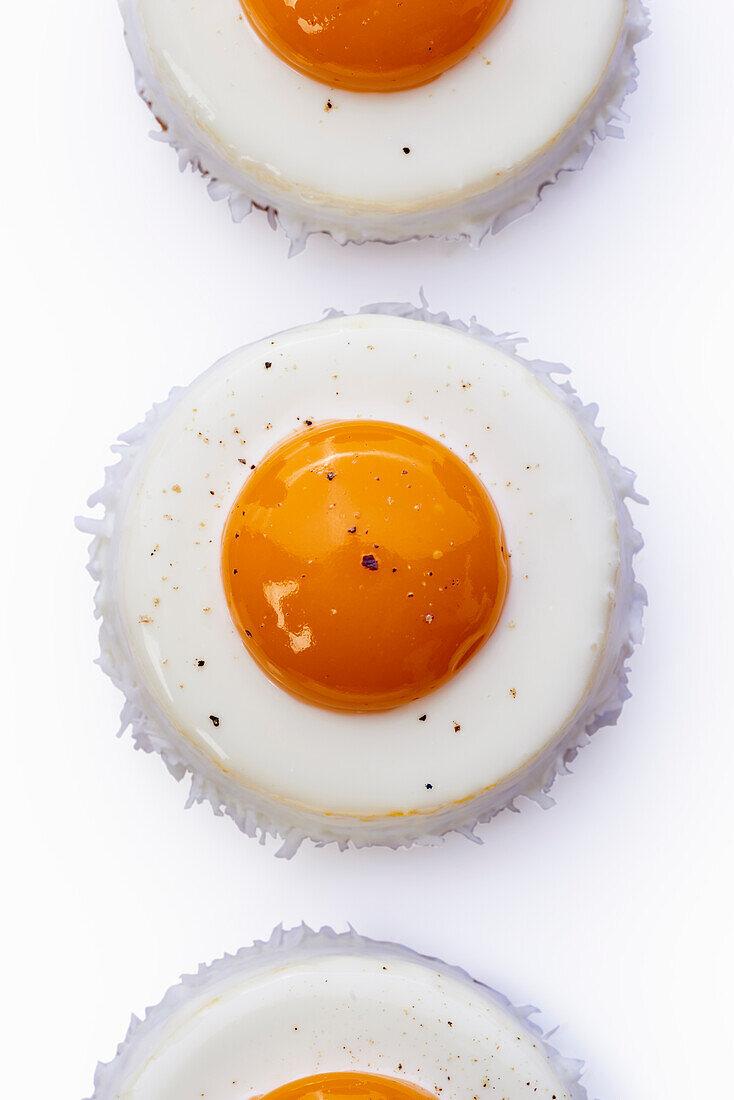 Mango and coconut tartlets in the shape of fried eggs