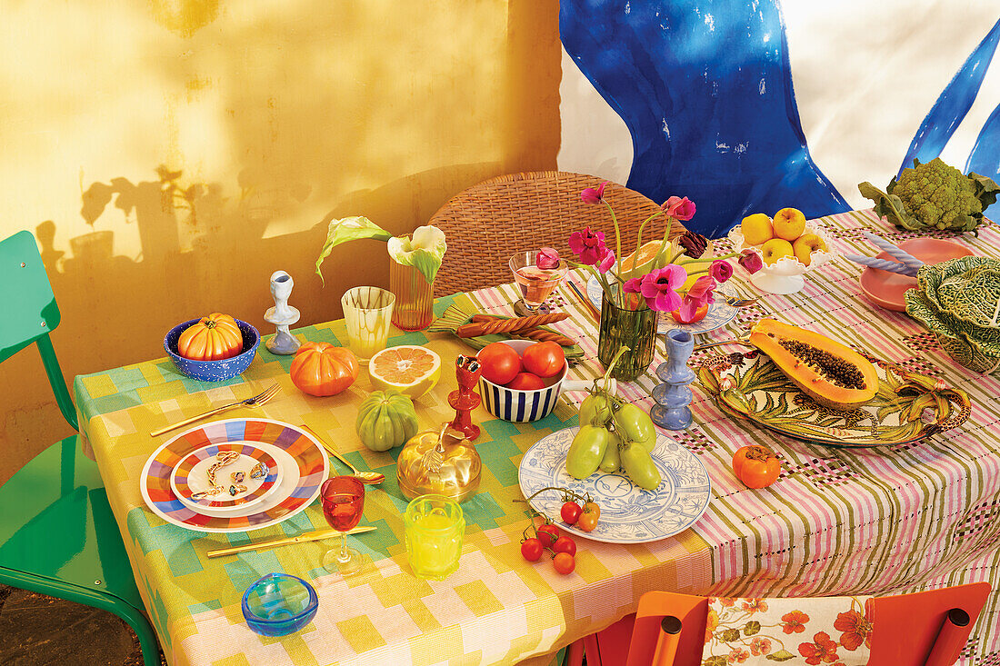 Colorfully laid table with fruit and vegetables