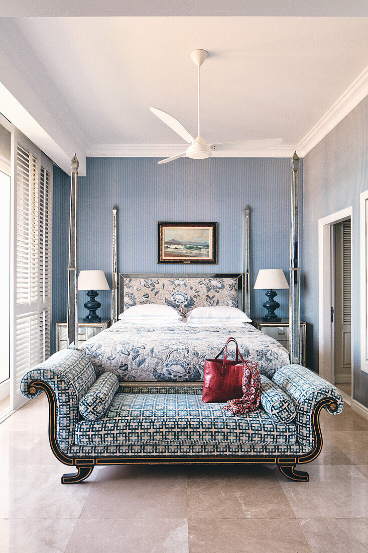 Elegant hotel room with upholstered bench