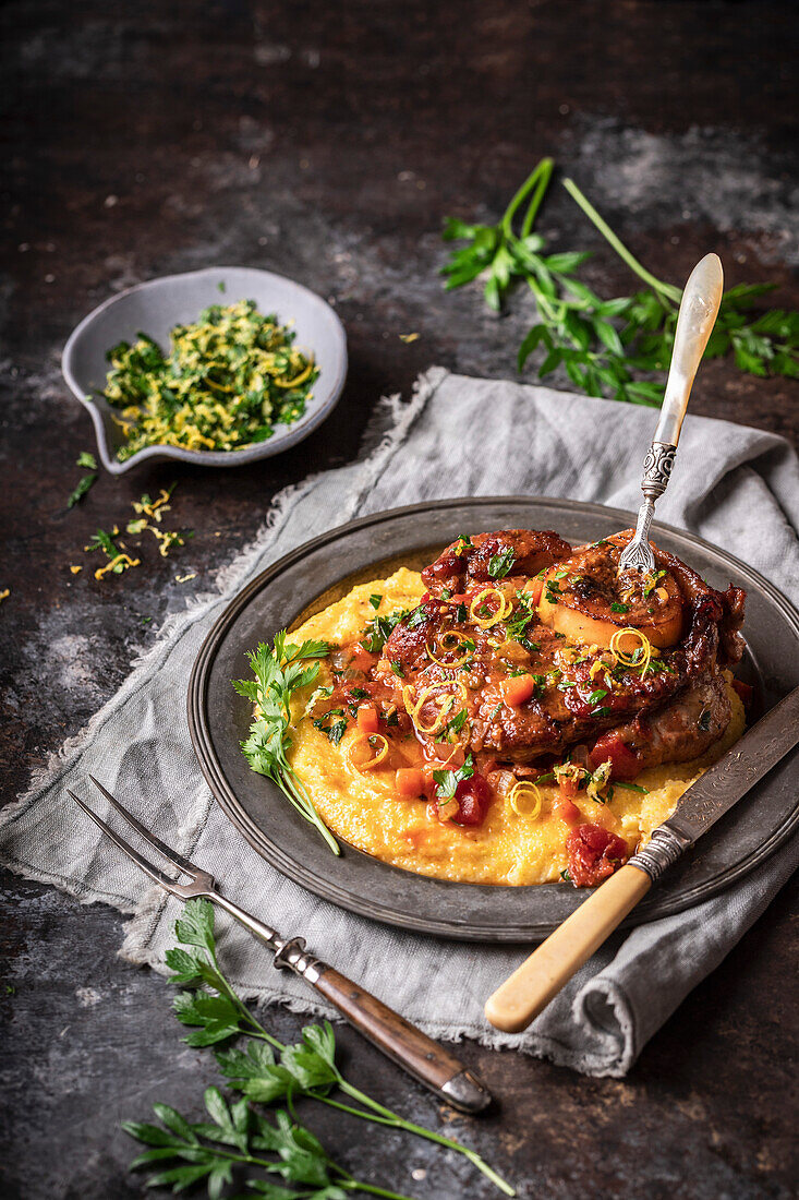 Osso bucco on polenta and vegetables