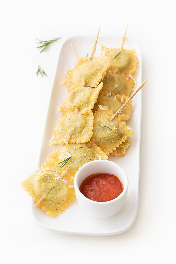 Spinach ricotta ravioli on skewers