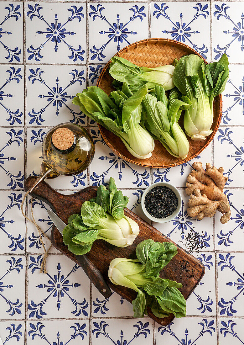 Fresh bok choy, black sesame seeds and vegetable oil