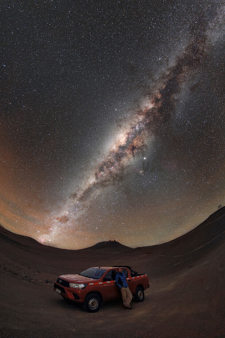 Man staring at the night sky, Atacama Desert, Chile