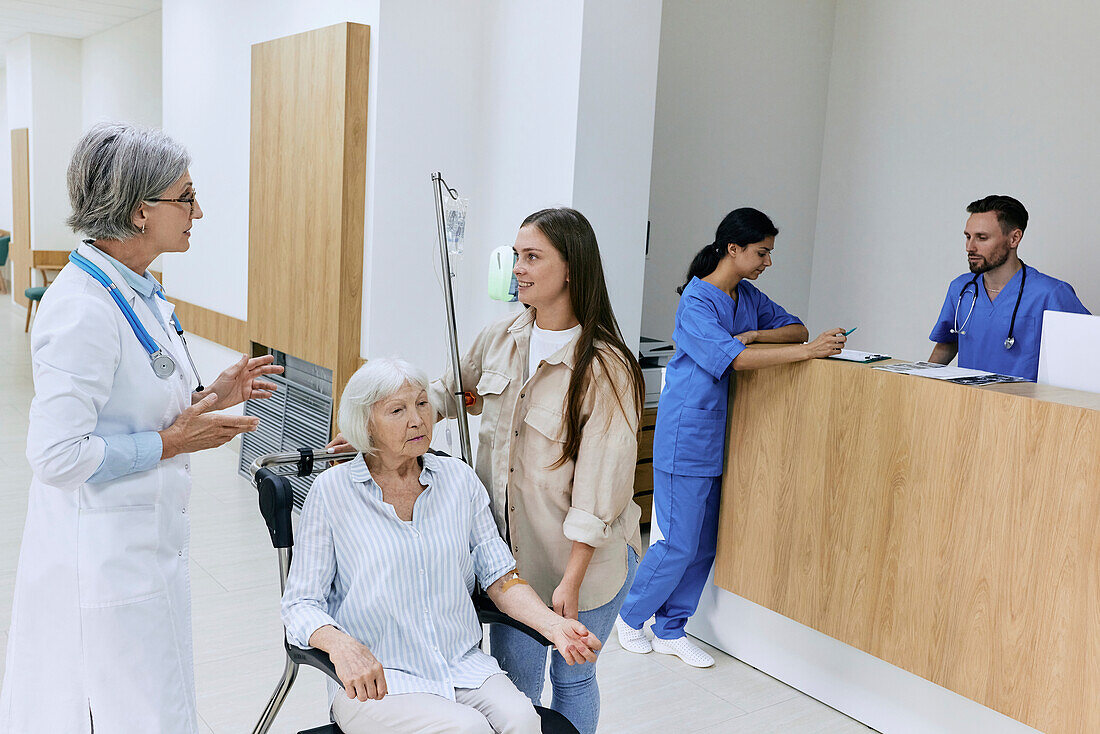 Doctor talking to patient's family