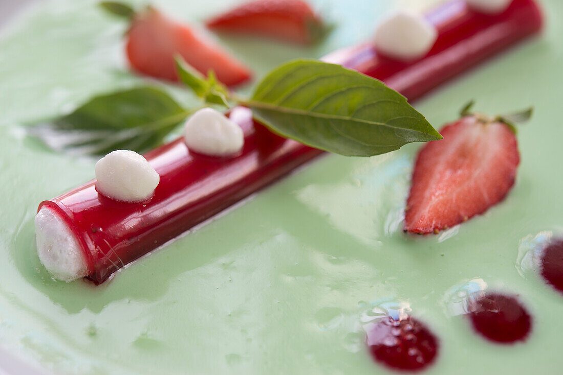 Dessert with mint cream and strawberries