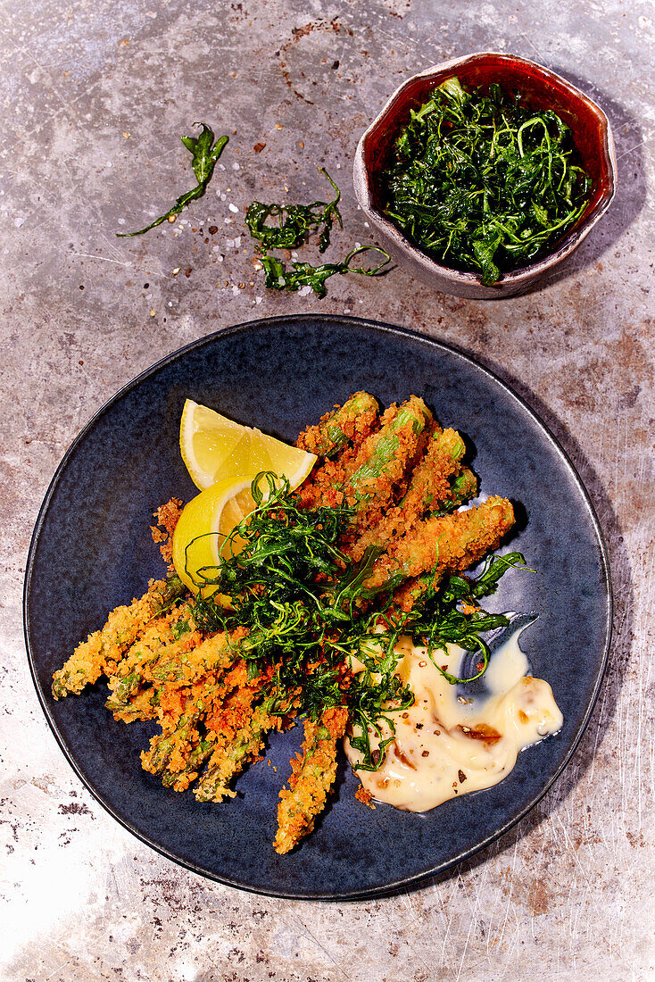 Breaded, deep-fried green asparagus (Italy)