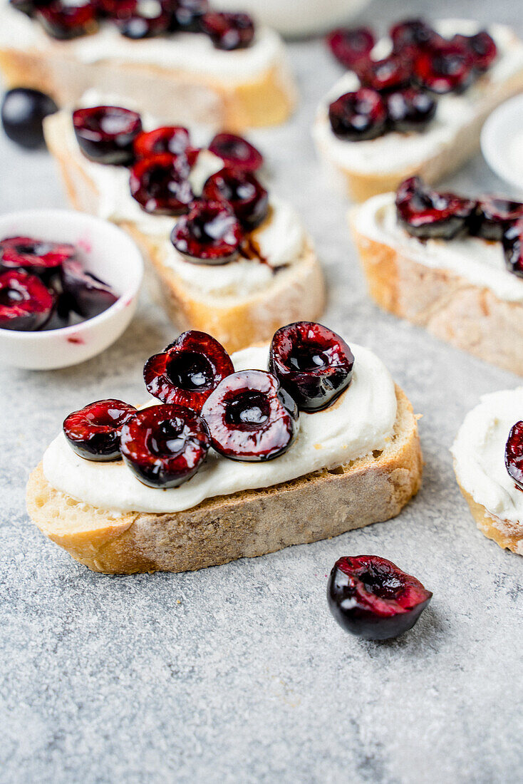 Bruschetta with balsamic cherries, ricotta and lemon