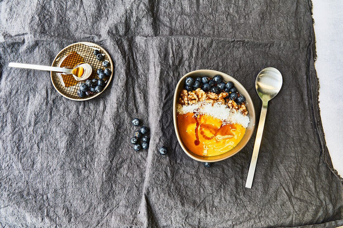 Breakfast Bowl with honey, blueberries, and walnuts