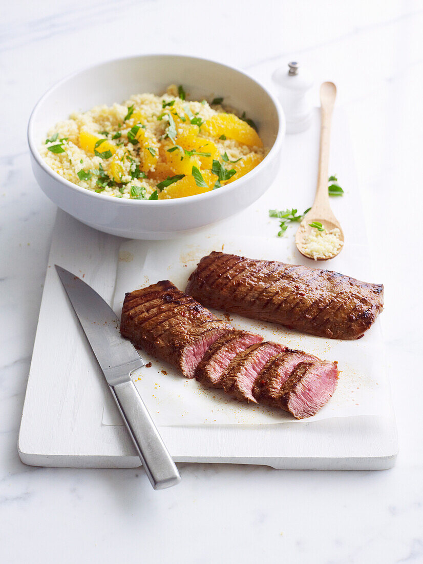 Harissa lamb with orange couscous