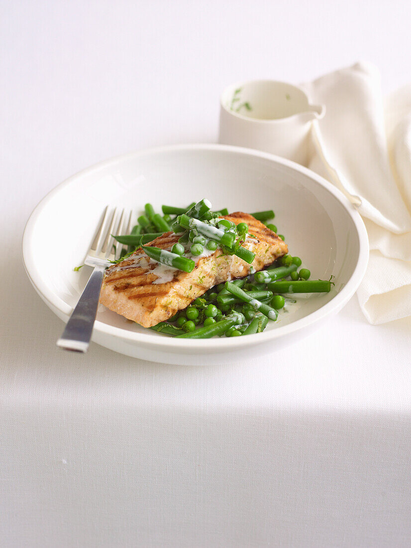 Salmon with minted peas and beans