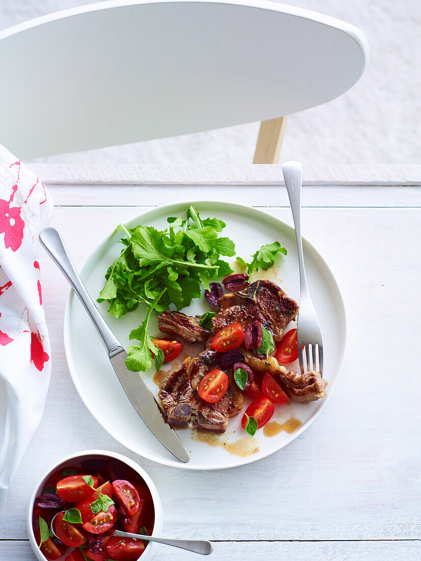 Lamb chops with tomato and olive salsa