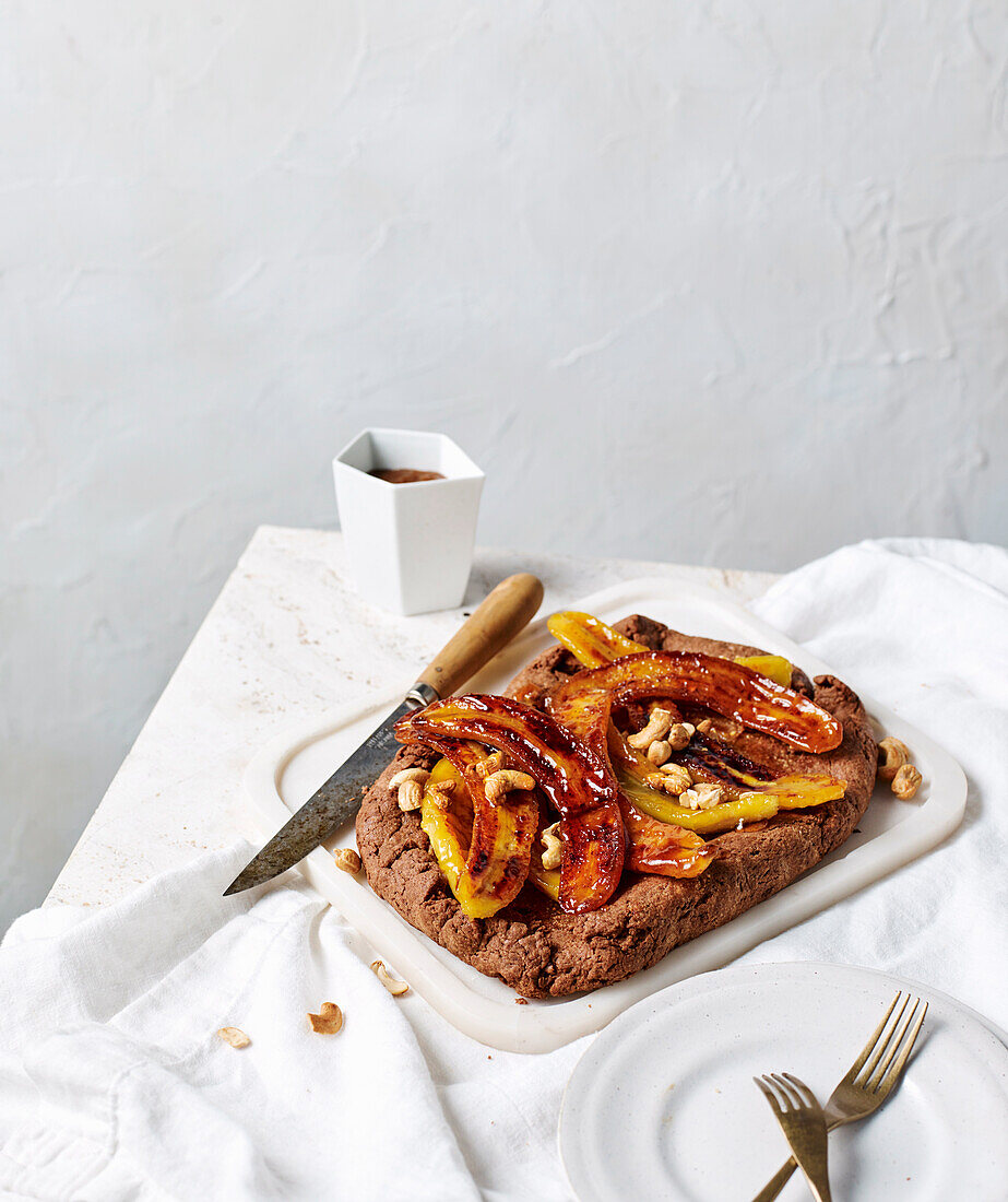 Cashew caramel, banana and date crostata