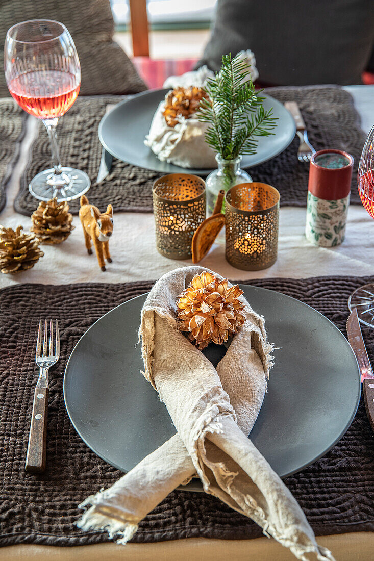 Festively decorated dining table with candlelight