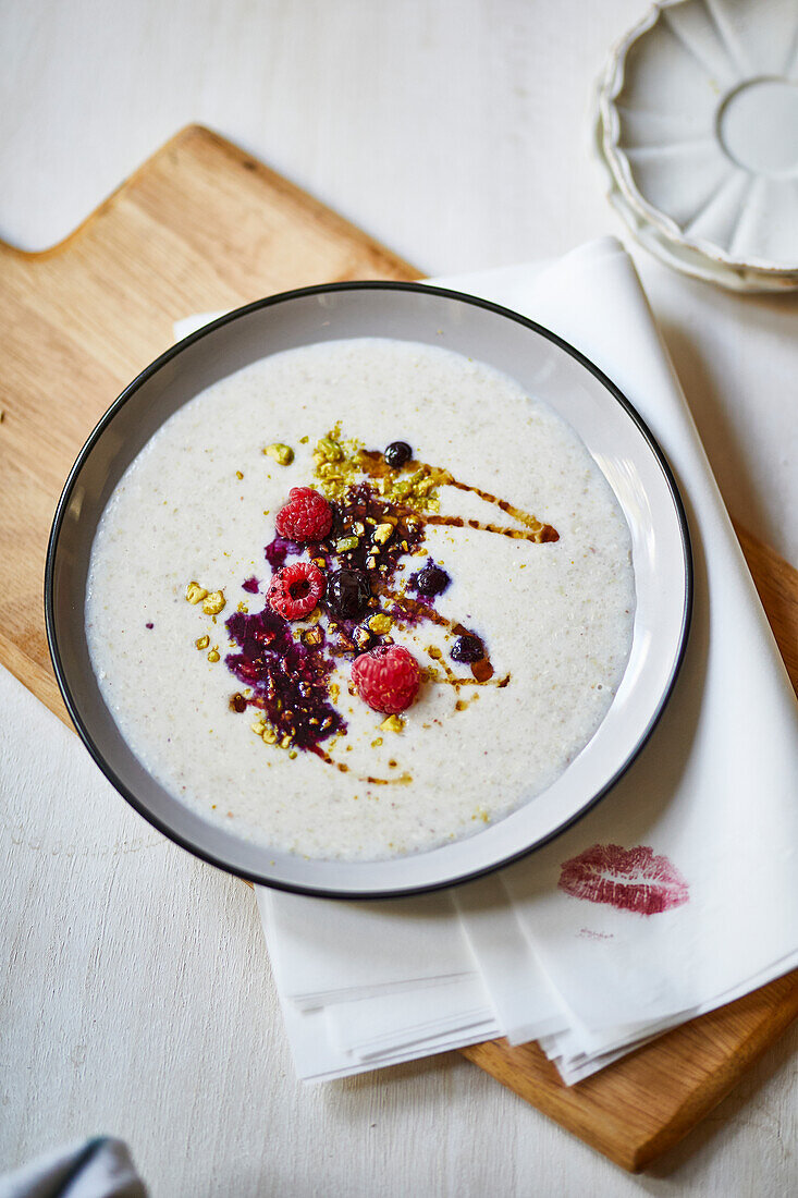 Buckwheat porridge with syrup and raspberries