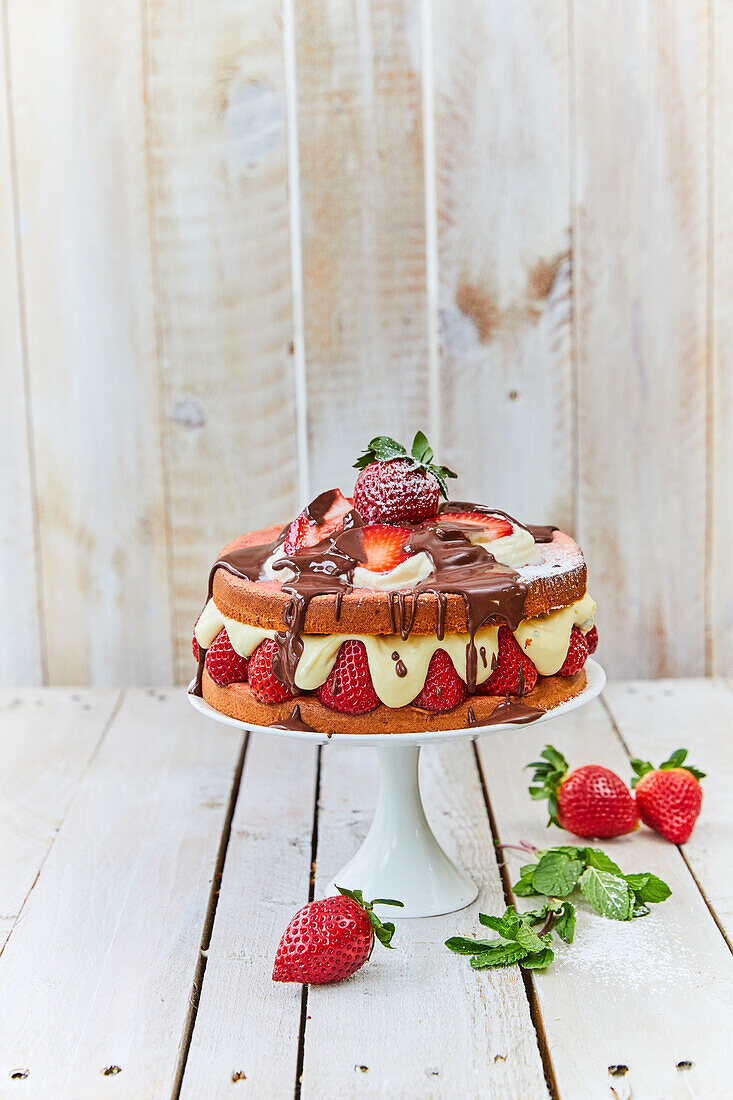 Strawberry cake with chocolate icing
