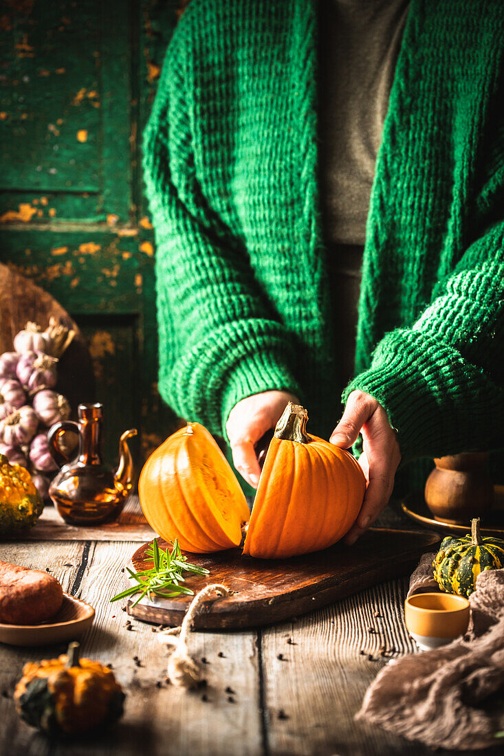 Pumpkin being cut in half