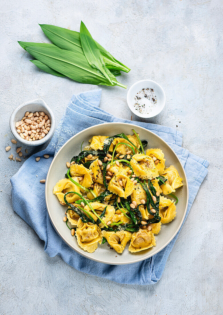 Wild garlic tortellini with pine nuts