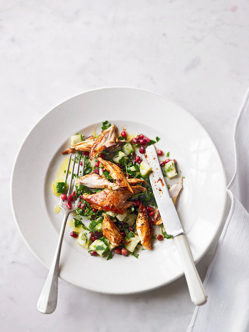 Guinea fowl winter salad with pomegranate seeds