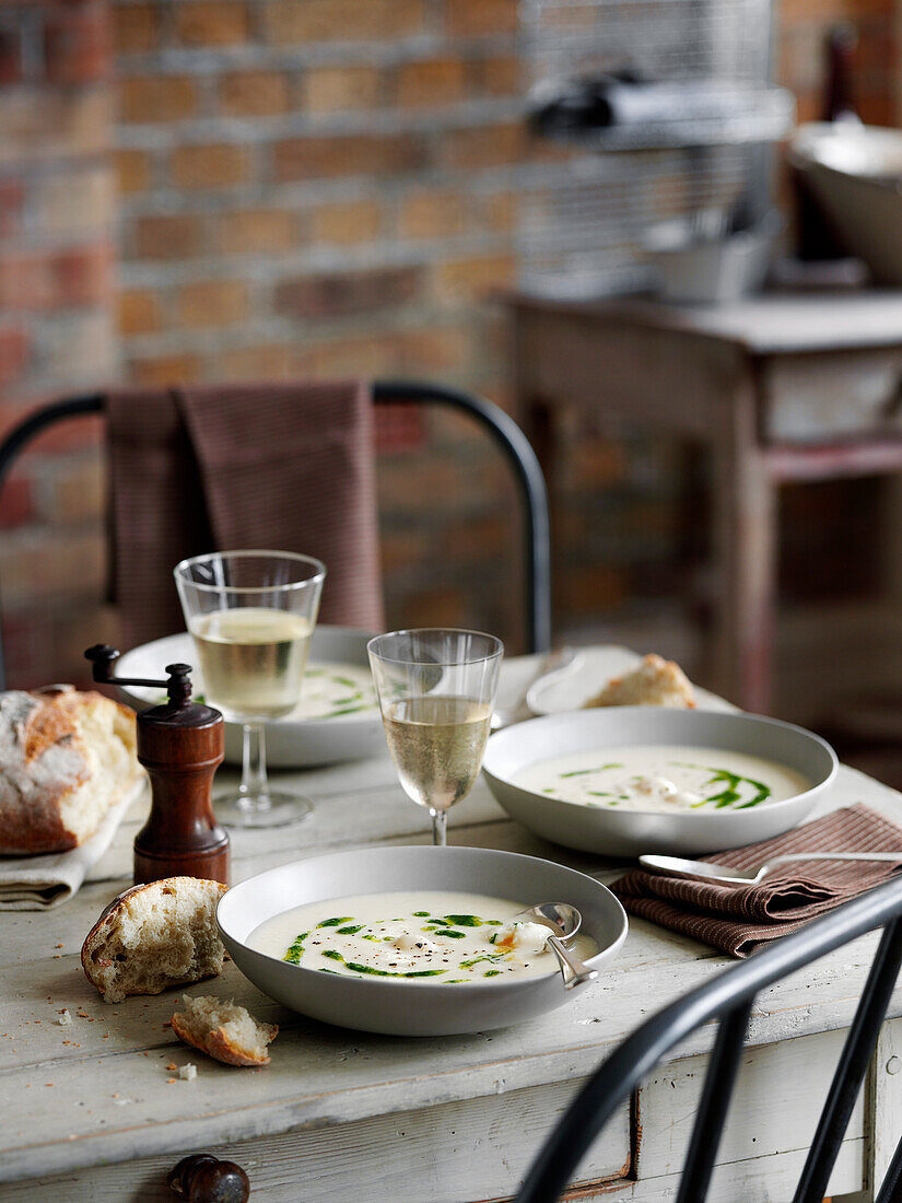 Celeriac soup with quail eggs and parsley oil