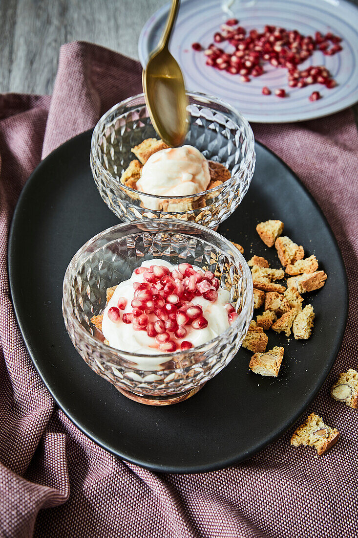 Mascarpone cream with pomegranate seeds and cantuccini