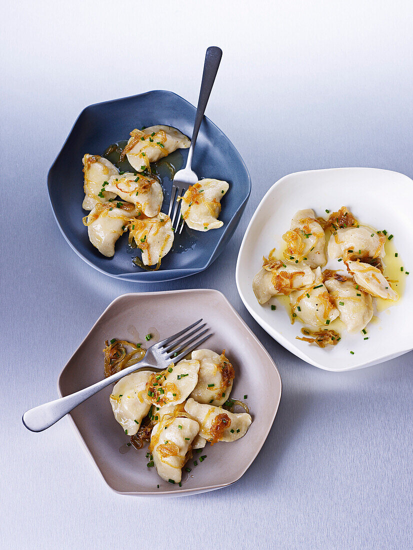 Three kinds of pierogies with potato, cheese, and bacon filling