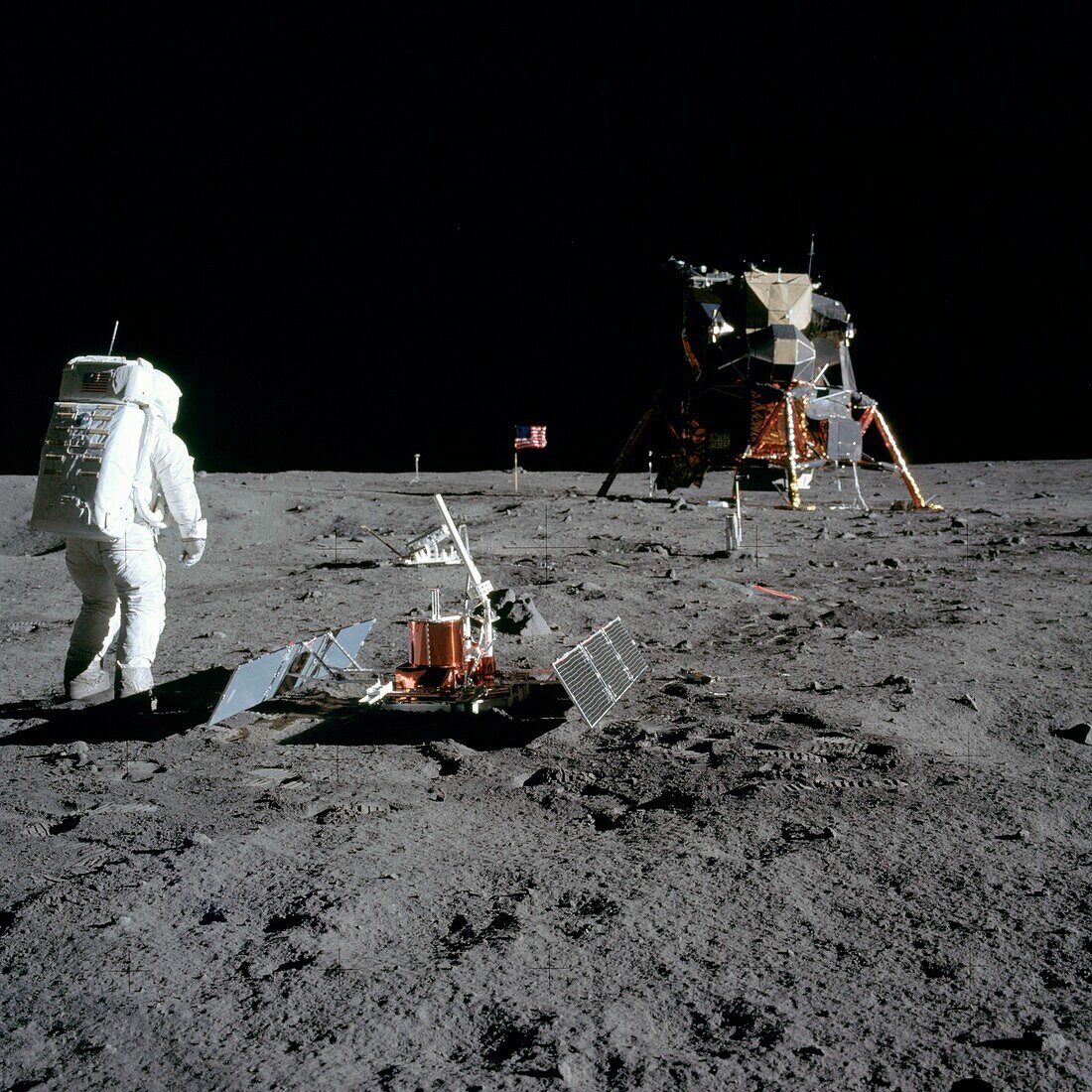 Apollo 11 astronaut Buzz Aldrin setting up experiment