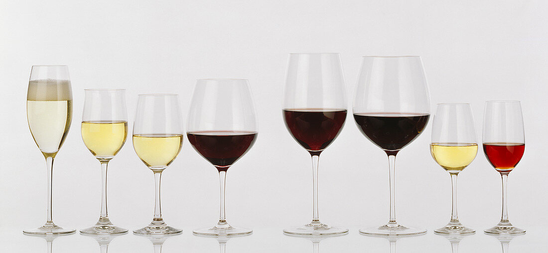 Assorted Red and White Wine in a Variety of Glasses