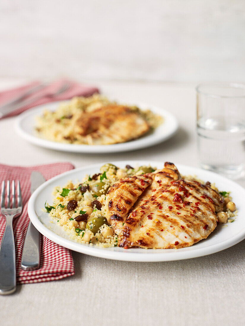 Lemon chicken with fruity olive couscous