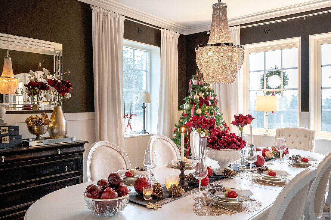 Christmas dining table in the dining room with Christmas tree