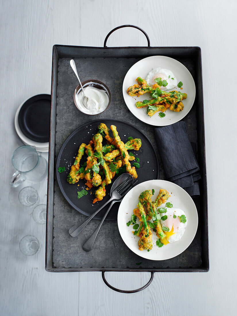 Fried broccoli with cumin, poached egg, and yogurt dip