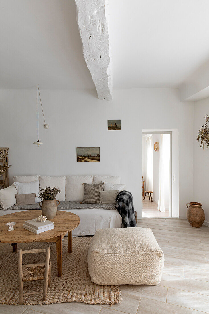 Bright living room in a minimalist style with rustic elements