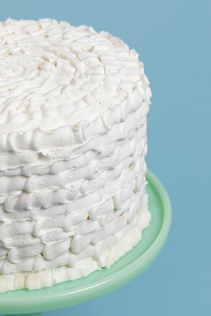 Layer cake, artfully decorated with white icing