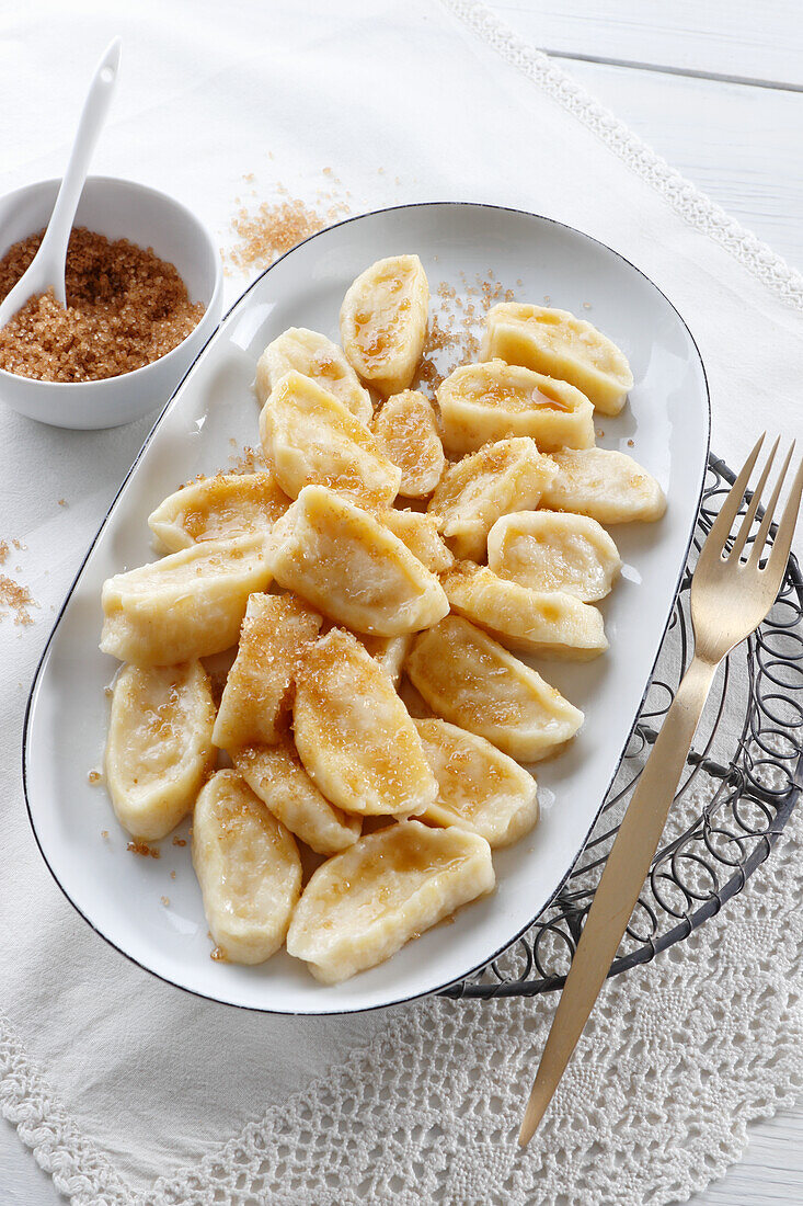 Polish pierogi Leniwe - sweet curd dumplings