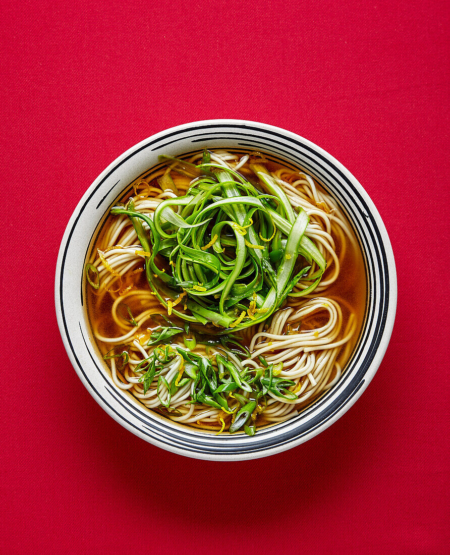 Miso ramen with asparagus, spring onions and lemon zest