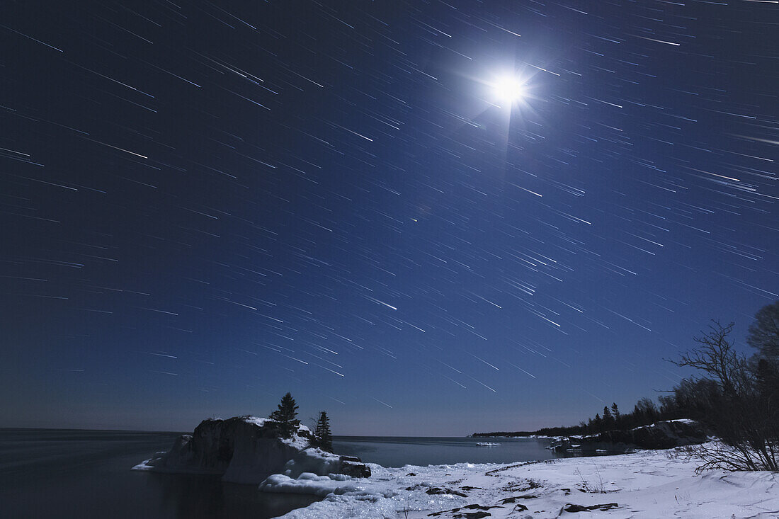 Full Moon With Shooting Stars; Grand Portage, Minnesota, United States Of America