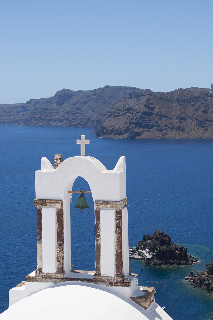 A Church Bell Tower Overlooking The Caldera; Oia, Santorini, Cyclades, Greek Islands, Greece