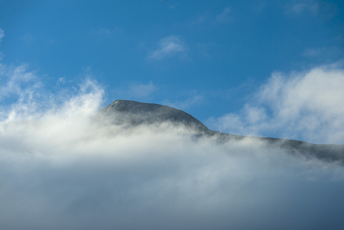 Ridge Of Mount Mulanje Appearing Above Early Morning Cloud; Malawi