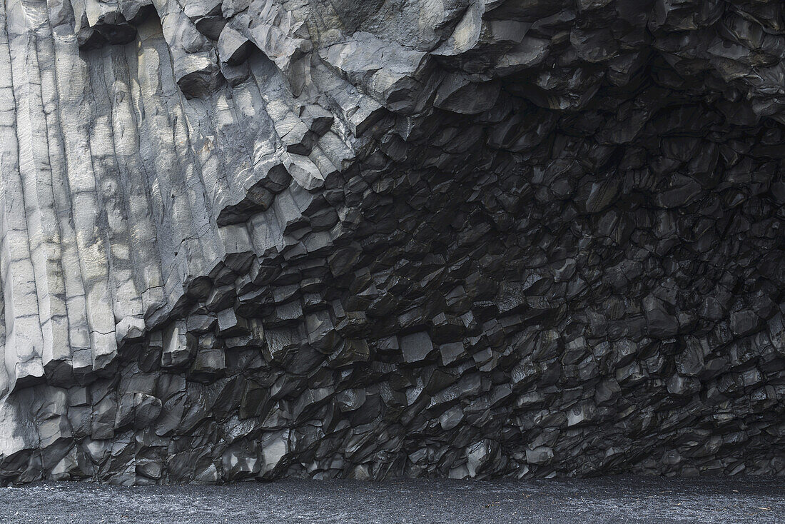 Hexagonal Basalt Columns Rise Out Of The Earth Near The Beaches Of Vik; Iceland