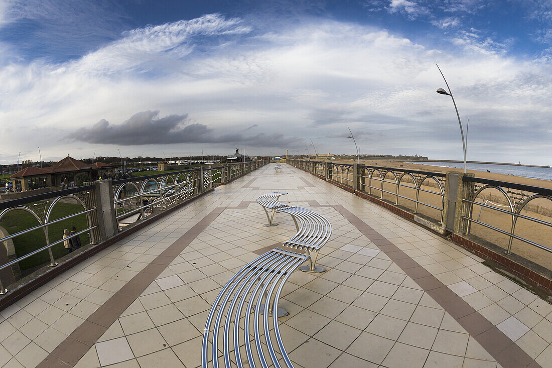 Curved Bench On The Promenade Along The Beach And Waterfront; South Shields, England