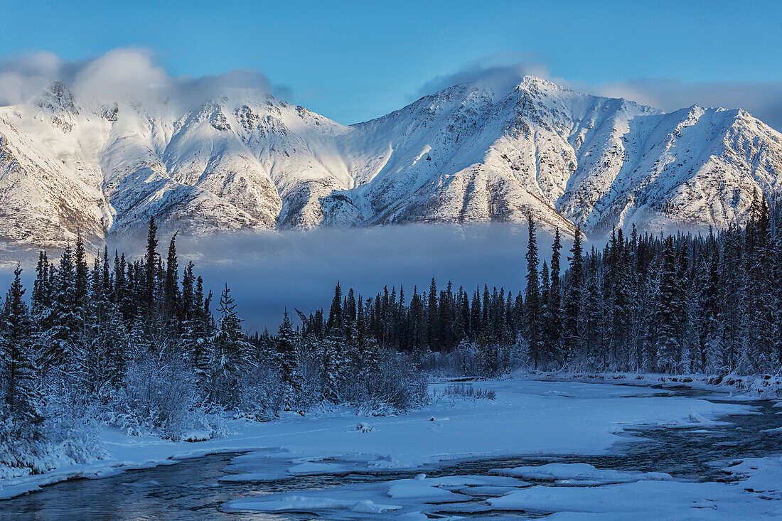 Grey Ridge Looms Over The Wheaton River Near Whitehorse; Yukon, Canada