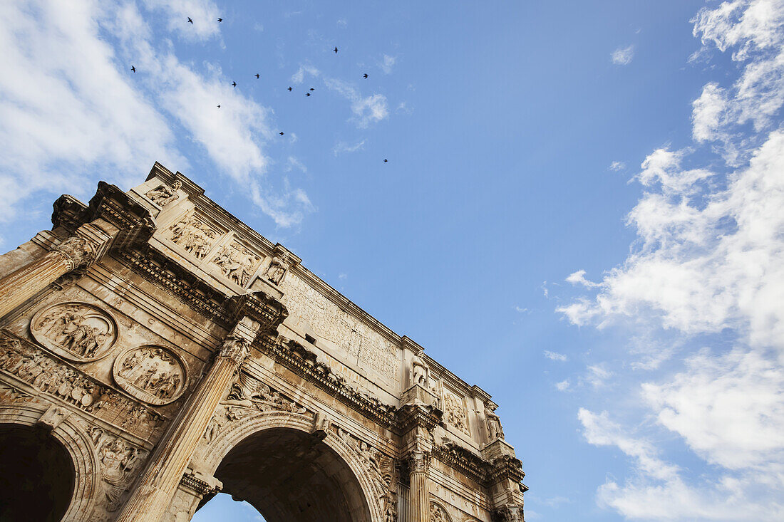 Low Angle View Of Ornate Wall Of The Arch Of Constantine; Rome, Italy