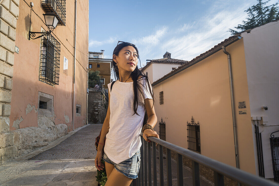 A Young Chinese Woman In Downtown Cuenca; Cuenca, Castile-La Mancha, Spain