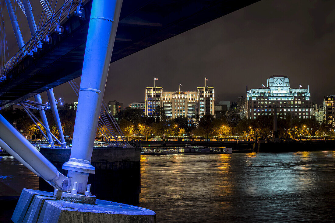 Hungerford Bridge And Golden Jubilee Bridges At Night; London, England