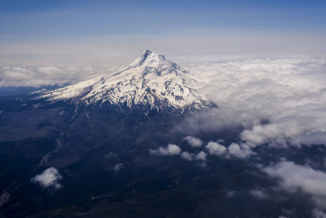 Mt. Hood Towers Above The Clouds; Hood River, Oregon, United States Of America